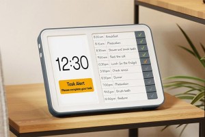 Digital clock showing reminders for meals, medicines etc