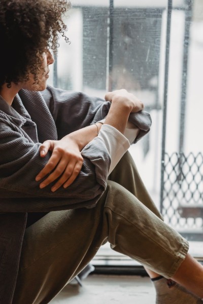 Long Covid - woman by window.jpeg